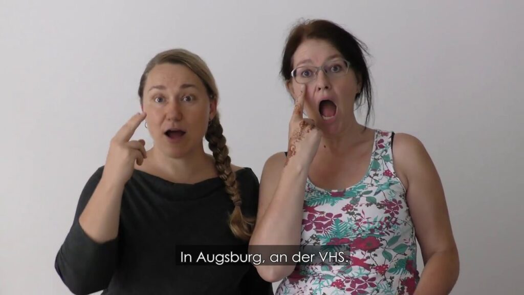 How to sign Vhs Augsburg Gebärdensprache in ASL