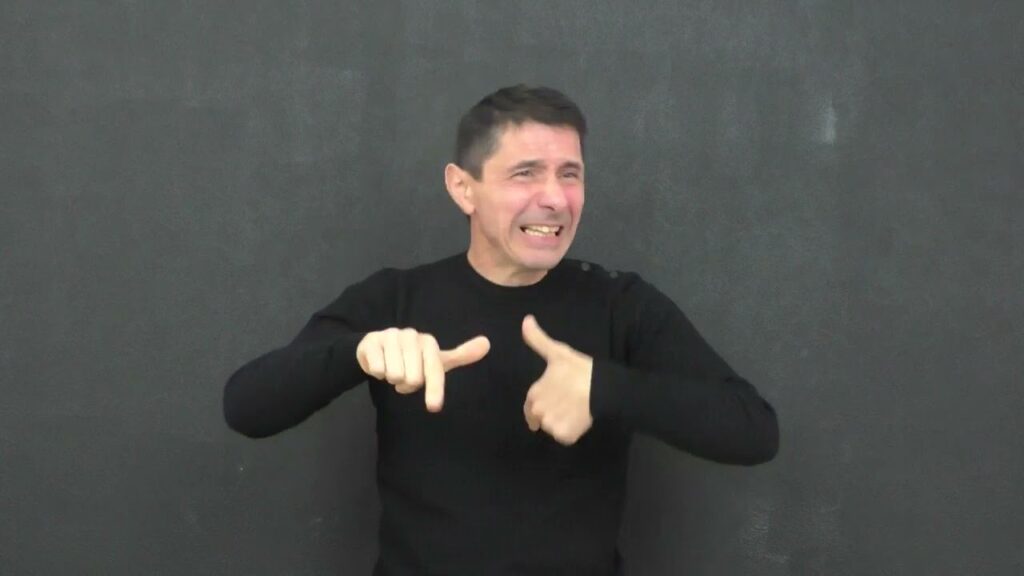 How to sign Signe Surpris Lsf in ASL